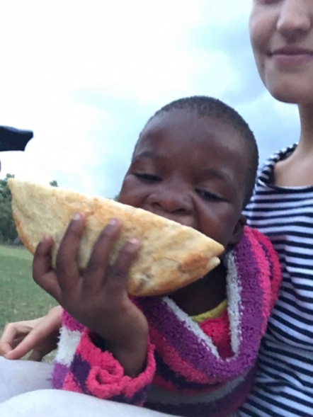 little girl big bread